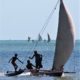 kids sailing pirogue